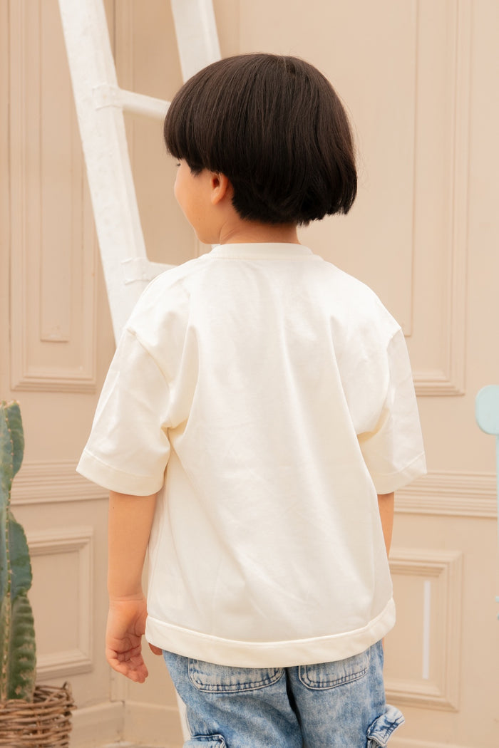 45662 CAMISETA OVERSIZE ESTAMPADO PUNTO CORAZON CON DOBLE RUEDO NIÑO JUNIOR
