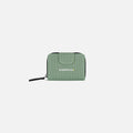 A Sherpani Barcelona Aloe Mist Green Anti-theft RFID Mini Wallet, front view showing clasp on white background. #color_aloe-mist-green