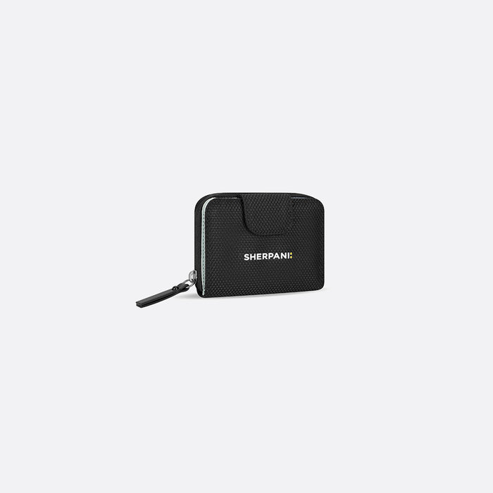 A Sherpani Barcelona Carbon Black Anti-Theft Mini Wallet, 3/4 view showing clasp on white background.  #color_carbon-black