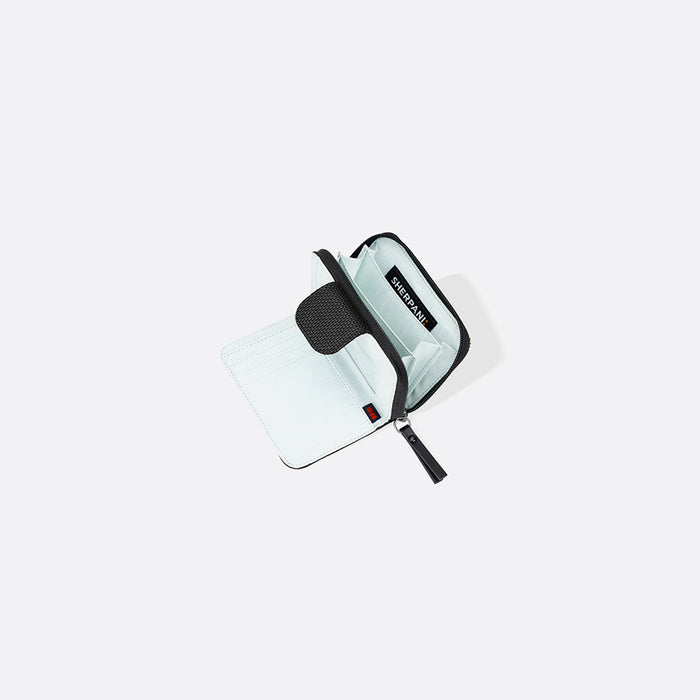A Sherpani Barcelona Carbon BlackAnti-theft Mini Wallet, above view showing inside wallet on white backdrop. #color_carbon-black