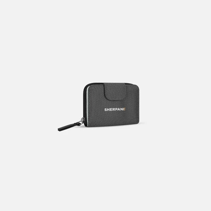 A Sherpani Barcelona Granite Anti-Theft Mini Wallet, 3/4 view showing clasp on white background.  #color_granite-grey
