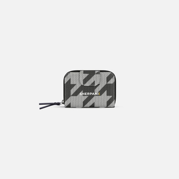 A Sherpani Barcelona Houndstooth Anti-Theft Mini Wallet, front view showing clasp on white background. #color_houndstooth-print
