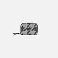 A Sherpani Barcelona Houndstooth Anti-Theft Mini Wallet, front view showing clasp on white background. #color_houndstooth-print