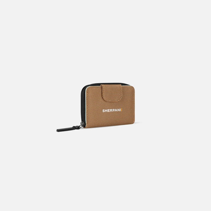 A Sherpani Barcelona Sand Anti-Theft Mini Wallet, 3/4 view showing clasp on white background. #color_sand-tan