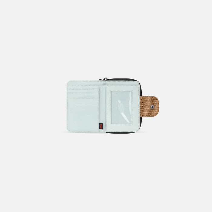 A Sherpani Barcelona Sand Anti-theft Mini Wallet, above view showing inside wallet on white backdrop.    #color_sand-tan