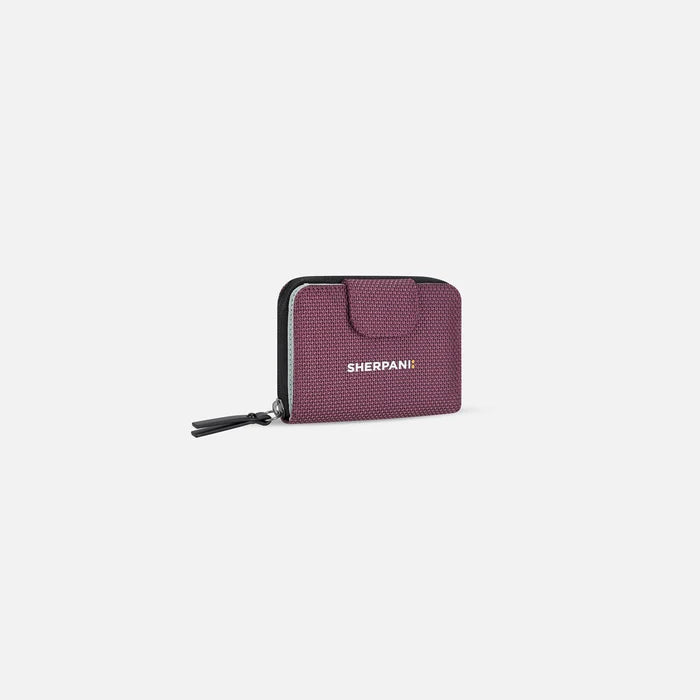 A Sherpani Barcelona Smoky Orchid Anti-Theft Mini Wallet, 3/4 view showing clasp on white background. #color_smoky-orchid-pink