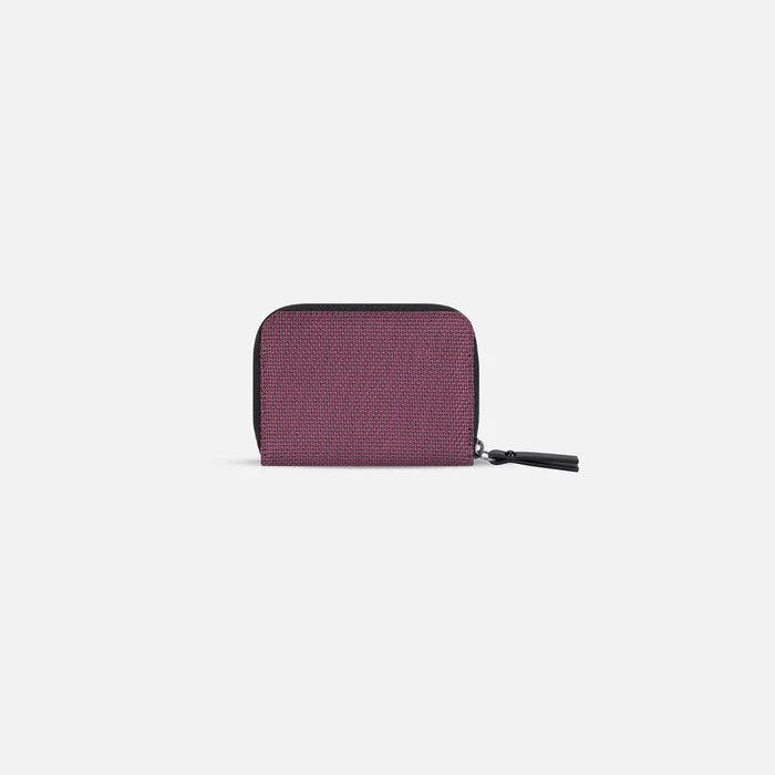A Sherpani Barcelona Smoky Orchid Anti-Theft Mini Wallet, back view on white background. #color_smoky-orchid-pink