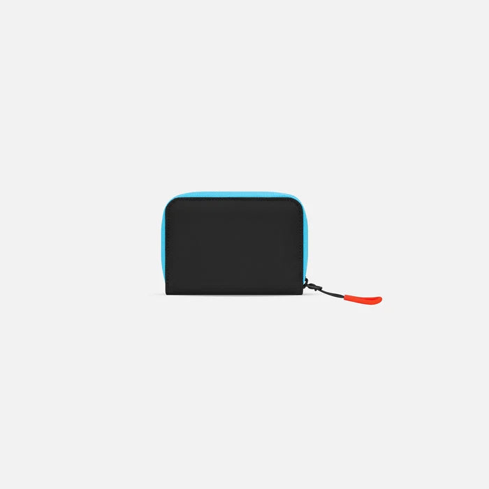 A Sherpani Barcelona Chromatic Black RFID Mini Wallet, back view on white background. #color_chromatic-black