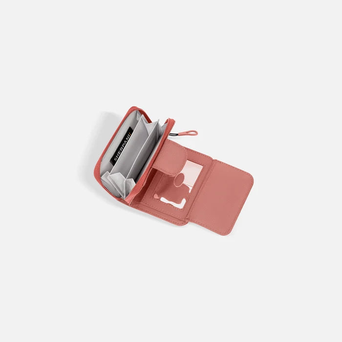 A Sherpani Barcelona  Desert Pink RFID Mini Wallet, above view showing inside wallet on white backdrop.  #color_desert-pink