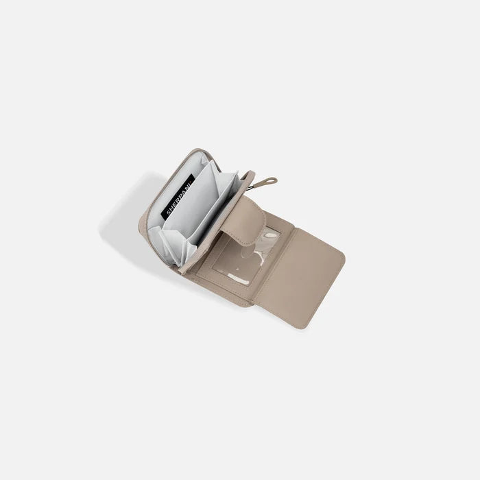 A Sherpani Barcelona Dune RFID Mini Wallet, above view showing inside wallet on white backdrop.  #color_dune-tan