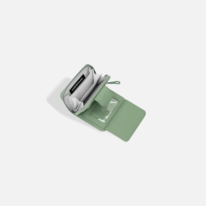 A Sherpani Barcelona Olivine RFID Mini Wallet, above view showing inside wallet on white backdrop.  #color_olivine-green