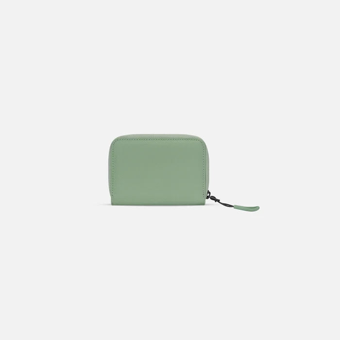 A Sherpani Barcelona Dune RFID Mini Wallet, back view on white background. #color_olivine-green