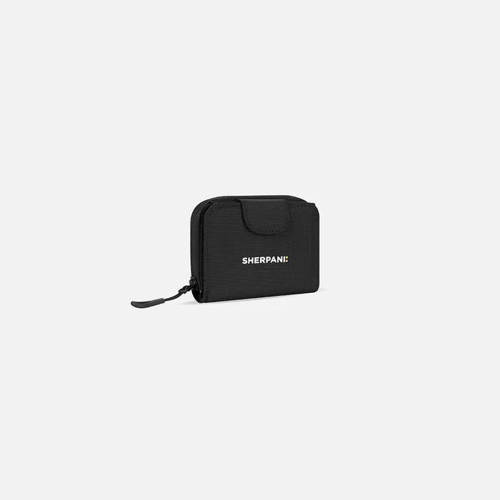 A Sherpani Barcelona Raven Black RFID Mini Wallet, 3/4 view showing clasp on white background.  #color_raven-black