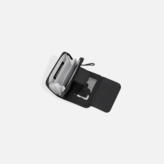 A Sherpani Barcelona Raven Black RFID Mini Wallet, above view showing inside wallet on white backdrop. #color_raven-black
