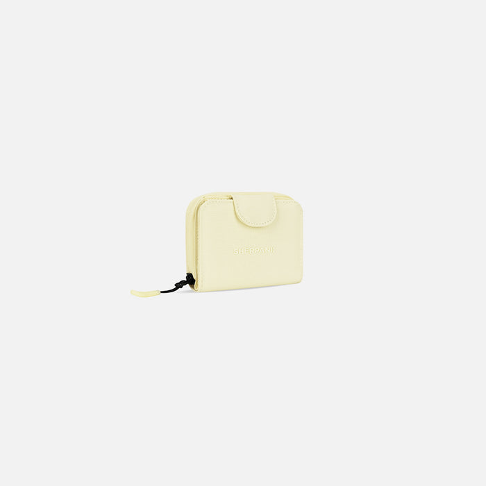 A Sherpani Barcelona Sol Yellow RFID Mini Wallet, 3/4 view showing clasp on white background.  #color_sol-yellow