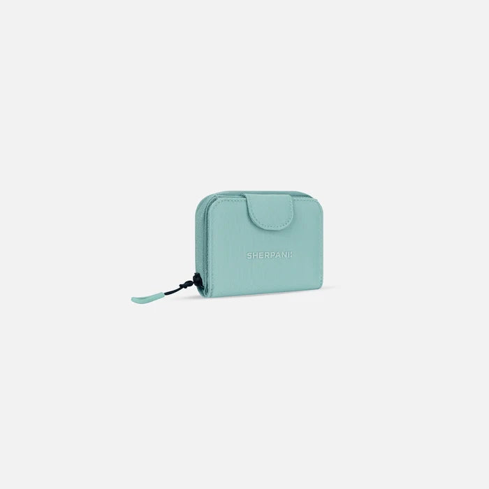 A Sherpani Barcelona Surf Blue RFID Mini Wallet, 3/4 view showing clasp on white background.  #color_surf-blue