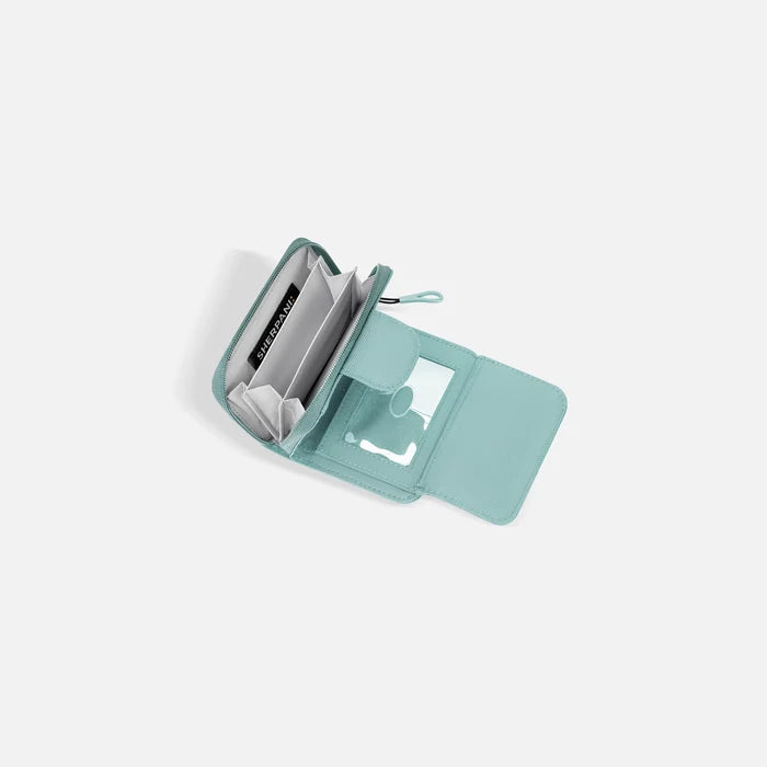 A Sherpani Barcelona Surf Blue RFID Mini Wallet, above view showing inside wallet on white backdrop.  #color_surf-blue