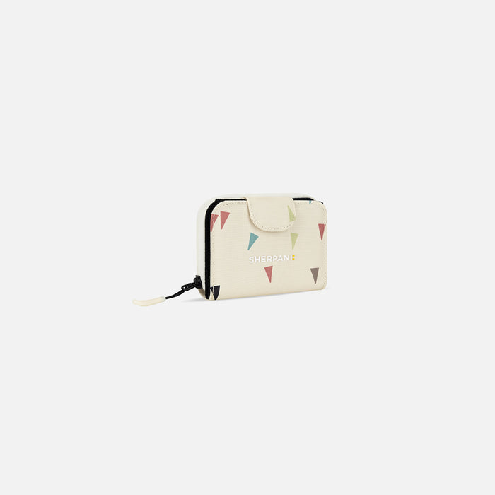 A Sherpani Barcelona Terrazzo Print RFID Mini Wallet, 3/4 view showing clasp on white background.  #color_terrazzo-print
