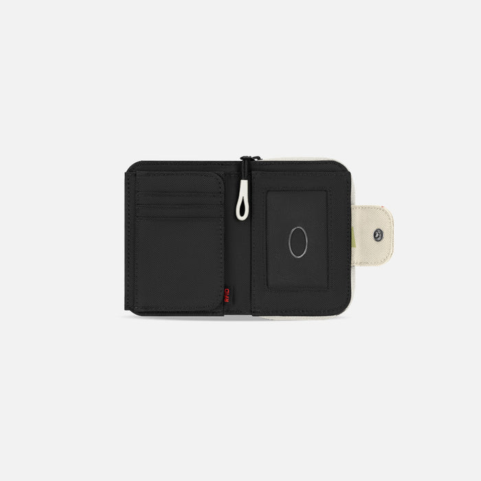 A Sherpani Barcelona Terrazzo Print RFID Mini Wallet, above view showing inside wallet on white backdrop.    #color_terrazzo-print