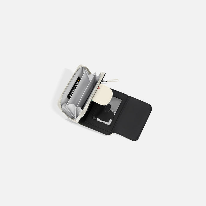 A Sherpani Barcelona Terrazzo Print RFID Mini Wallet, above view showing inside wallet on white backdrop.    #color_terrazzo-print