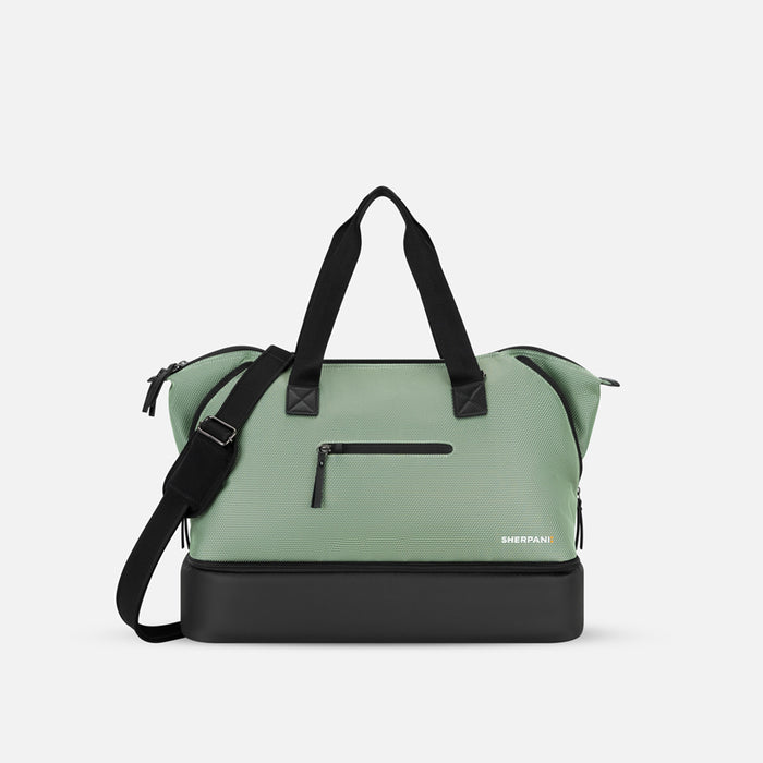 A Sherpani Boston Aloe Mist Green Anti-theft Weekender, front view showing front lockable pocket on white background. #color_aloe-mist-green