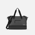 A Sherpani Boston Granite Anti-theft Weekender, front view showing front lockable zipper pocket against a white background. #color_granite-grey