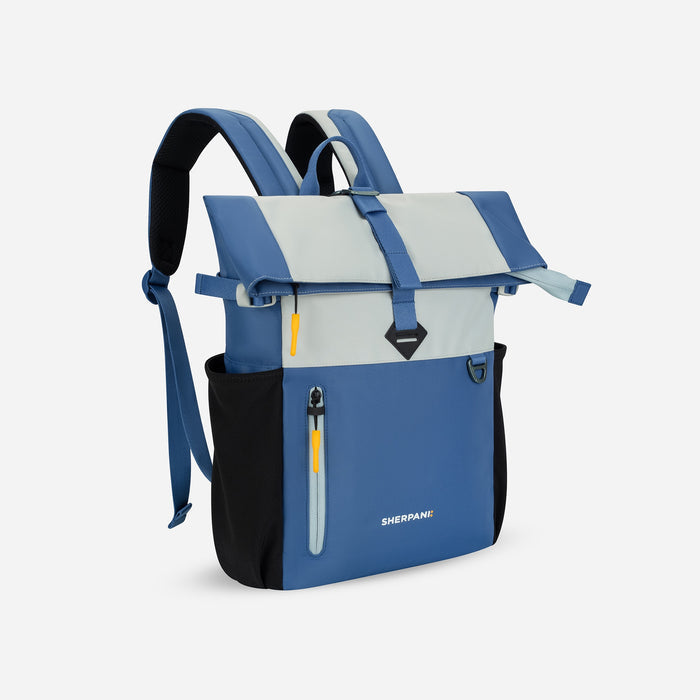 A Sherpani Cabo Seatstone Day Pack, 3/4 view showing lockable zipper and fold-over pocket against a white background.  #color_seastone