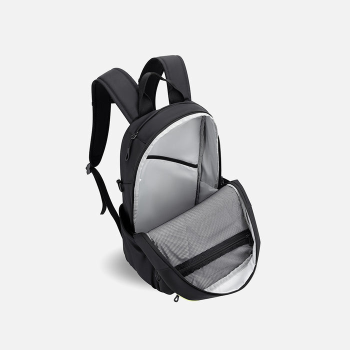 A Sherpani Camden Raven Black Backpack, 3/4 view showing inside of main pocket on a white background.  #color_raven-black