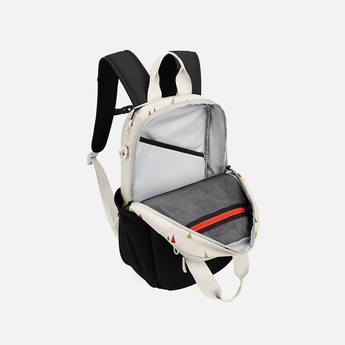 A Sherpani Camden Terrazzo Print Backpack, 3/4 view showing inside of main pocket on a white background.  #color_terrazzo-print
