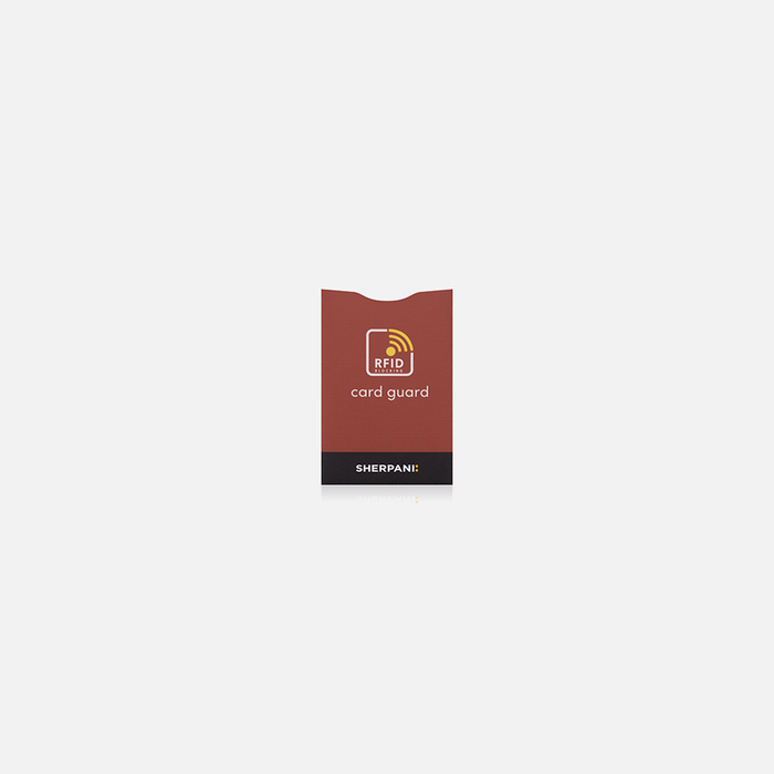 A Sherpani Passport Guard Cider RFID Sleeve on white backdrop.