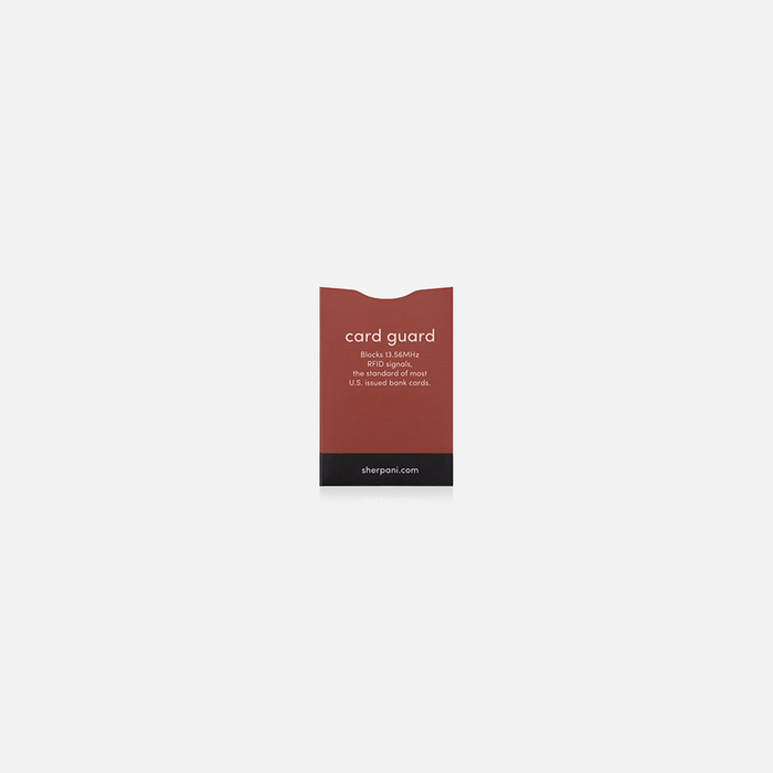 A Sherpani Passport Guard Cider RFID Sleeve on white backdrop.