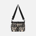 A Sherpani Ceara Ciao Expandable Crossbody, front view showing two front pockets and adjustable strap on a white background.  #color_ciao-print