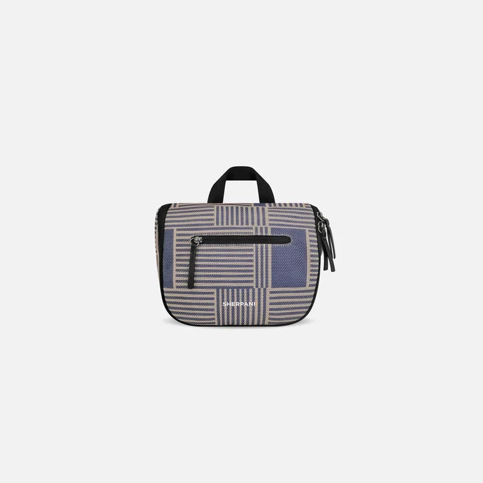 A Sherpani Co-Pilot Passport Travel Toiletry Case, front view showing handheld strap and zipper pockets on white backdrop. #color_passport-print