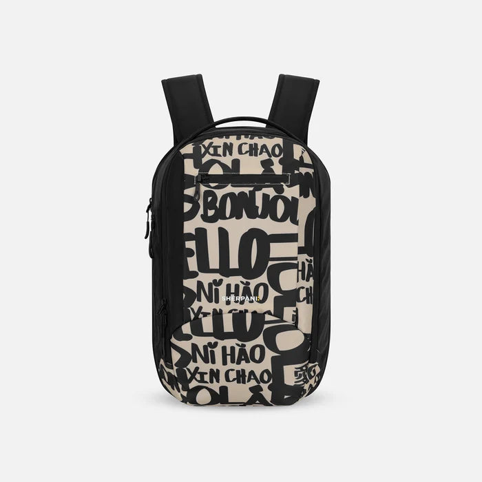 A Sherpani Crew Ciao Travel Backpack, front view showing lockable zippers and different straps against a white background. #color_ciao-print
