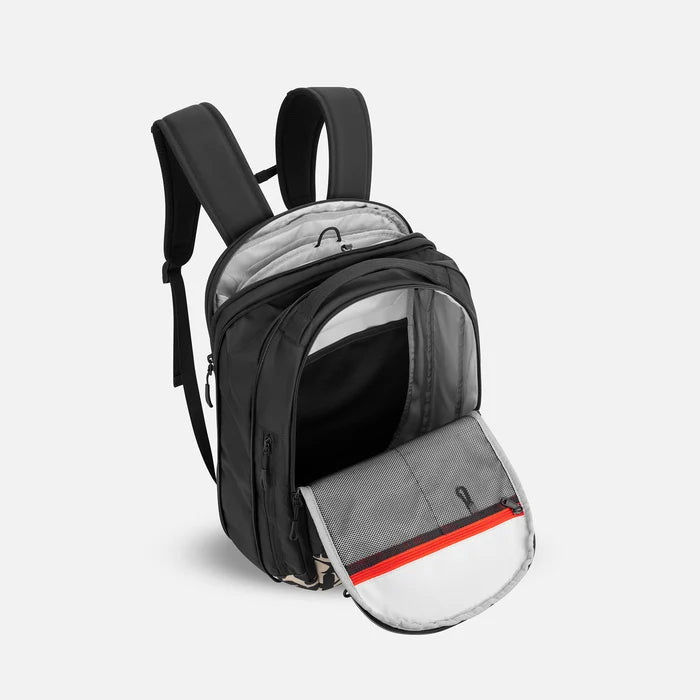 A Sherpani Crew Ciao Travel Backpack, above view showing inside main and laptop pocket against a white background. #color_ciao-print