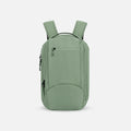A Sherpani Crew Olivine Travel Backpack, front view showing lockable zippers and different straps against a white background. #color_olivine-green