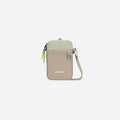 A Sherpani Cruz Desert Aloe Small Crossbody, front view showing strap and main pocket zipper on white backdrop.   #color_desert-aloe