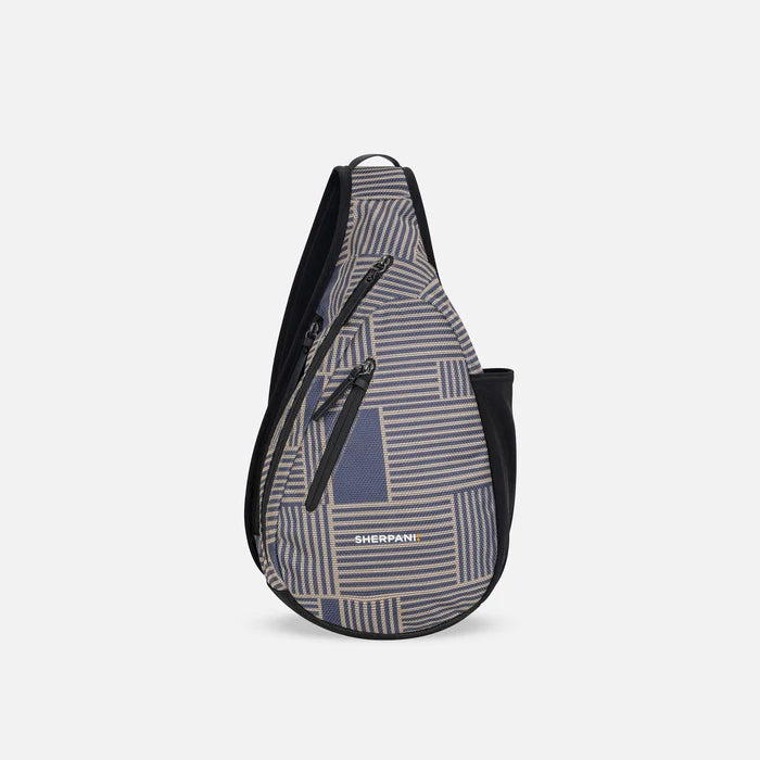A Sherpani Esprit Passport Anti-theft Sling, front view showing strap & lockable pockets on white backdrop.  #color_passport-print