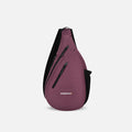 A Sherpani Esprit Smoky Orchid Anti-theft Sling, front view showing strap & lockable pockets on white backdrop. #color_smoky-orchid-pink
