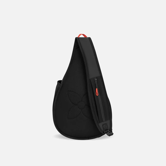 A Sherpani Esprit Chromatic Black Sling Bag, back view showing the strap pocket and the chair lock on a white background. #color_chromatic-black