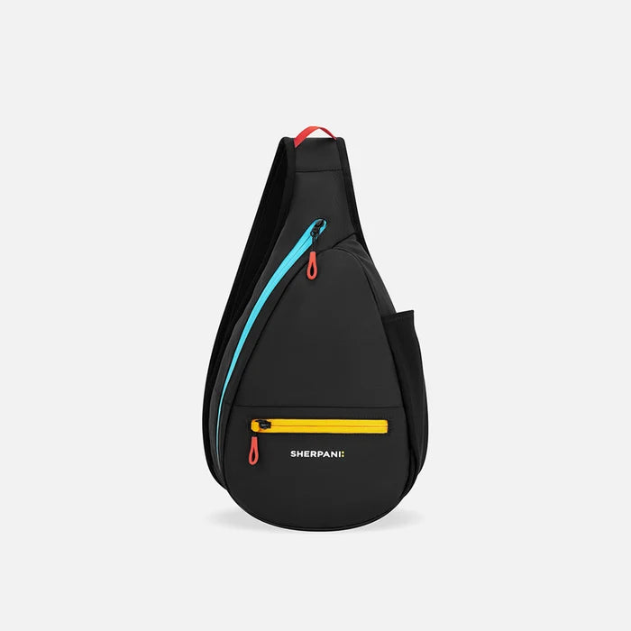 A Sherpani Esprit Chromatic Black Sling, front view showing strap & lockable pockets on white backdrop.  #color_chromatic-black