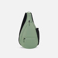 A Sherpani Esprit Olivine Sling, front view showing strap & lockable pockets on white backdrop.  #color_olivine-green