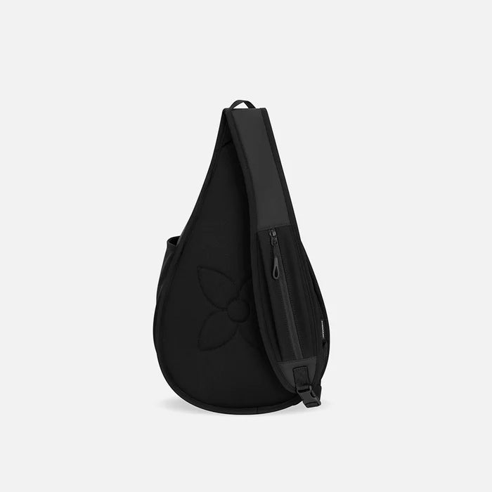 A Sherpani Esprit Raven Black Sling Bag, back view showing the strap pocket and the chair lock on a white background. #color_raven-black