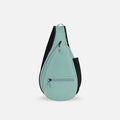 A Sherpani Esprit Surf Blue Sling, front view showing strap & lockable pockets on white backdrop.  #color_surf-blue