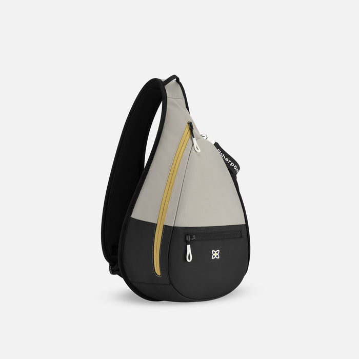 A Sherpani Esprit Wasabi Stone Sling Bag, 3/4 view showing pockets and strap on white background.  #color_wasabi-stone-heritage