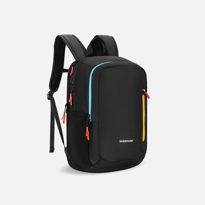 A Sherpani Getaway Chromatic Black Travel Backpack, 3/4 view showing lockable zipper pocket and straps on a white background. #color_chromatic-black