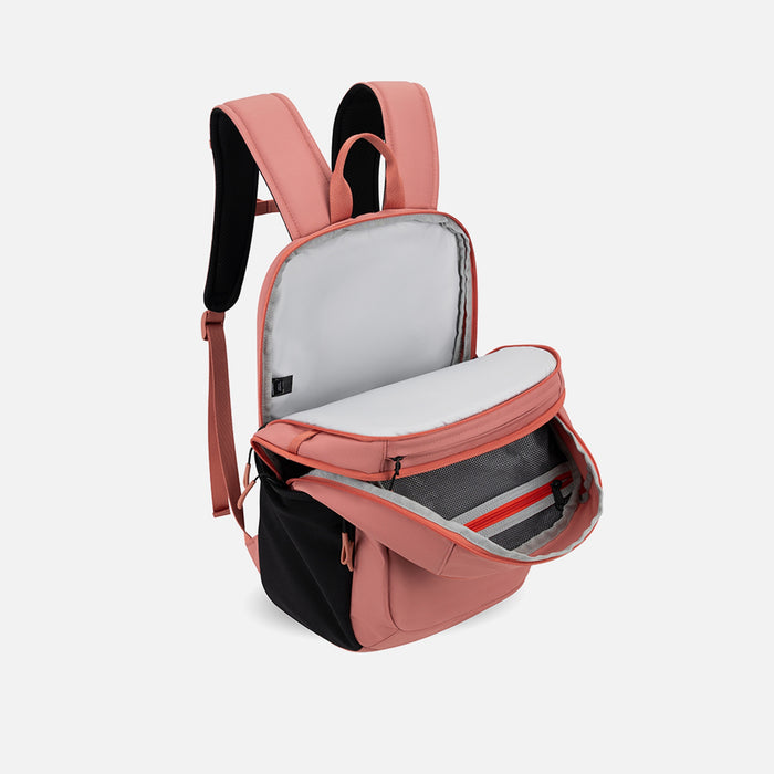A Sherpani Getaway Desert Pink Travel Backpack, 3/4 showing inside all pockets on white backdrop. #color_desert-pink