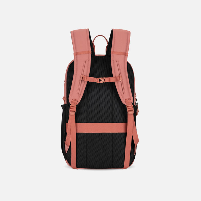A Sherpani Getaway Desert Pink Travel Backpack, back view showing shoulder straps and luggage strap on white background. #color_desert-pink