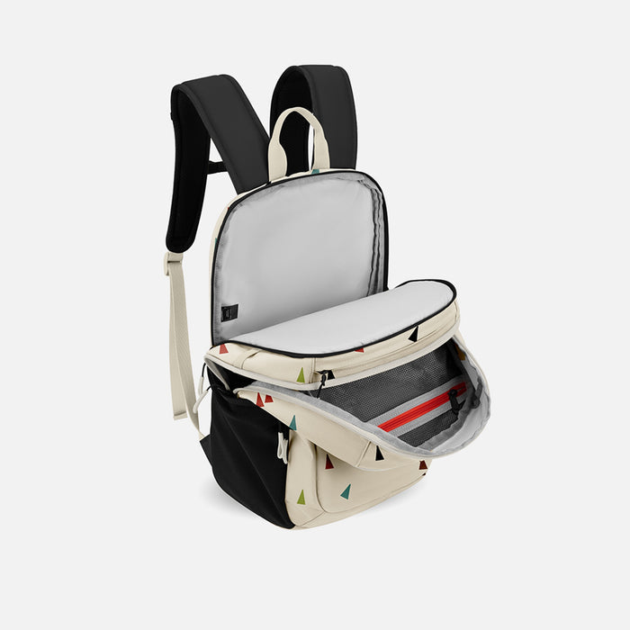 A Sherpani Getaway Terrazzo Travel Backpack, 3/4 showing inside all pockets on white backdrop. #color_terrazzo-print