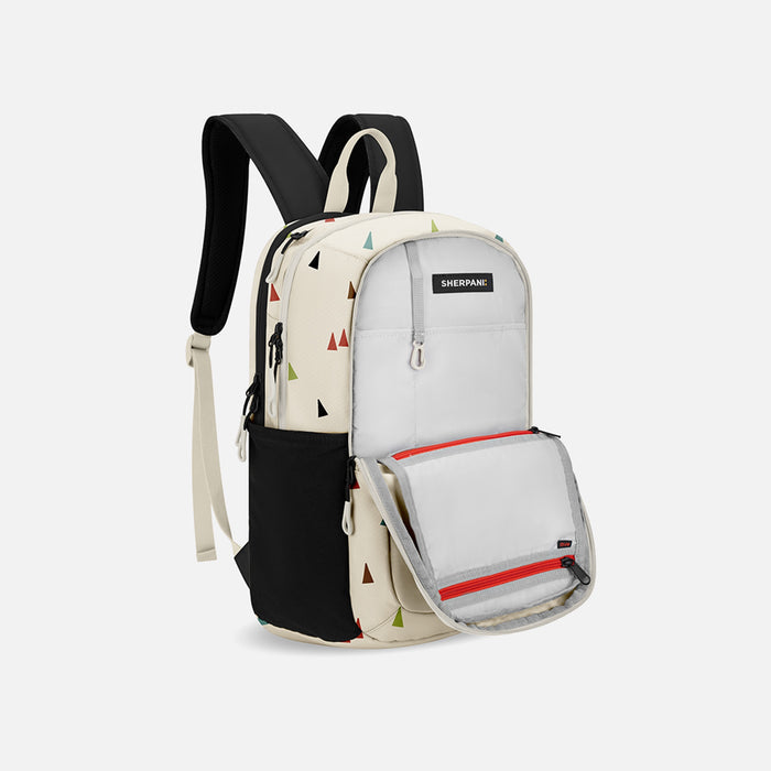 A Sherpani Getaway Terrazzo Print Travel Backpack, 3/4 showing inside a pocket on white backdrop. #color_terrazzo-print